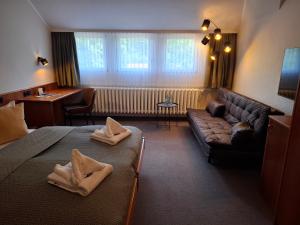 Ein Sitzbereich in der Unterkunft Hotel Burgblick Meißen