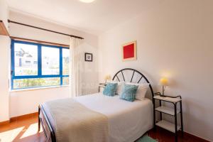 Postel nebo postele na pokoji v ubytování Casa do Sol by AcasaDasCasas