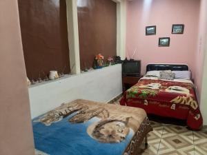 Ένα ή περισσότερα κρεβάτια σε δωμάτιο στο Hotel Don Rene +43 φωτογραφίες