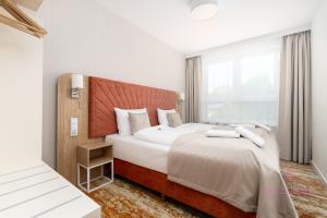 Ένα ή περισσότερα κρεβάτια σε δωμάτιο στο Your Holidays Bel Mare 333 F