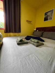 Postel nebo postele na pokoji v ubytování Pousada Morango das Palmas