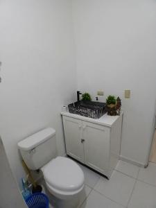 Fotografie z fotogalerie ubytování VILLA CON PISCINA en los jardines Boca Chica v destinaci Boca Chica