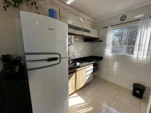 Kuchyň nebo kuchyňský kout v ubytování Apartamento WJM