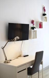 Et tv og/eller underholdning på Apartamento-estudio Corazón de Alicante