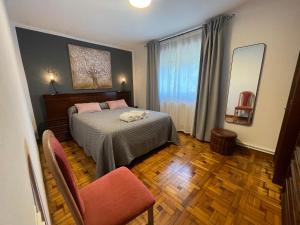 Postel nebo postele na pokoji v ubytování Vete Polo Segau, Seguencu