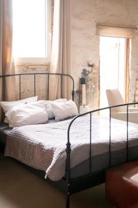 Ένα ή περισσότερα κρεβάτια σε δωμάτιο στο BarnLoft mit Whirlpool & Kamin