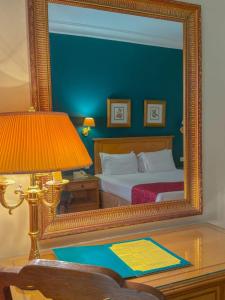 Rúm í herbergi á Amarante Pyramids Hotel