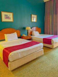 Rúm í herbergi á Amarante Pyramids Hotel