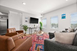 Μια τηλεόραση ή/και κέντρο ψυχαγωγίας στο Cozy Ski Lodge 2BR 2BA Rooftop Garage