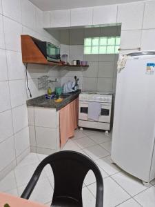 Kuchyň nebo kuchyňský kout v ubytování Apartamento Centro Arraial do cabo