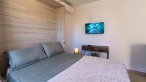 Ένα ή περισσότερα κρεβάτια σε δωμάτιο στο Studio La Madrague Côte d'Azur