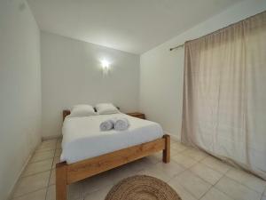 Letto o letti in una camera di Les Hauts de Bezouce, Vue, Piscine & Calme