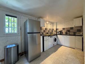 Cucina o angolo cottura di Les Hauts de Bezouce, Vue, Piscine & Calme