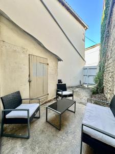 Posezení v ubytování Le Repos urbain, près de Carat et Naval group