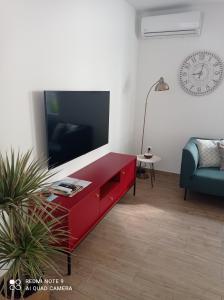 Televisyen dan/atau pusat hiburan di Apartman Linda