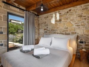 Ένα ή περισσότερα κρεβάτια σε δωμάτιο στο Petra Retreat Residence +72 φωτογραφίες