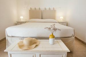 Postel nebo postele na pokoji v ubytování Antica Masseria Ficazzana - Tenuta