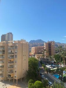a view of a city with buildings and a street at Apartamentos Finestrat I-II in Cala de Finestrat