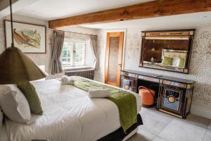 Ένα ή περισσότερα κρεβάτια σε δωμάτιο στο Weston Manor Hotel +165 φωτογραφίες
