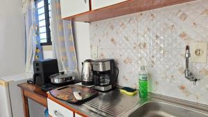 Kuchyň nebo kuchyňský kout v ubytování JG&A Home