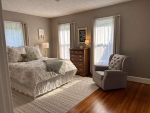 Postel nebo postele na pokoji v ubytování The Wheeler's House