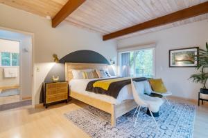 a bedroom with a large bed and a wooden ceiling at Sonoma Creek Haven in Kenwood +63 photos