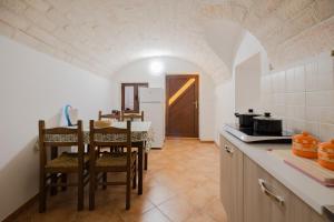 Kuchyň nebo kuchyňský kout v ubytování Casa Vittoria