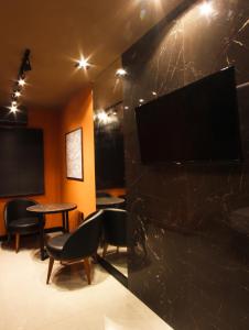 TV a/nebo společenská místnost v ubytování Motel San Rafael Mais