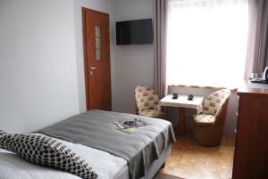 Un pat sau paturi într-o cameră la Villa Amiro