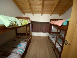 a room with two bunk beds and a window at Villa Rovishta in Dukaj +45 photos