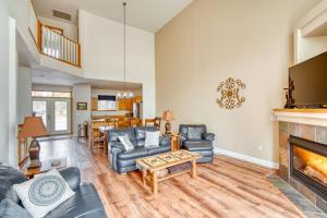 a living room with couches and a fireplace at Hot-Tub - 4BDR - Located in Eagle Crest Resort in Redmond