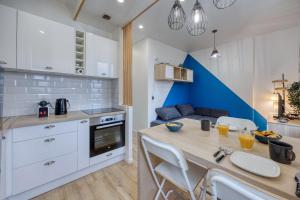 Kuchyň nebo kuchyňský kout v ubytování La Chartreuse - Wifi - Tram A + 14 fotografií