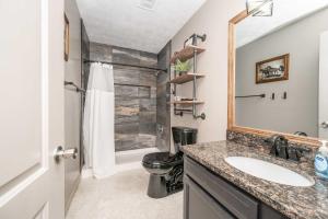 a bathroom with a sink and a shower at Arkstone Retreat 2 - Chic 2 Bedroom in Williamstown