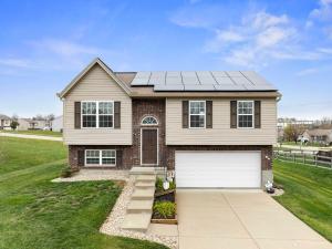 a house with a solar panel on top of it at The Ark Encounter Retreat in Walton