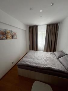 Postel nebo postele na pokoji v ubytování Belvedere apartament