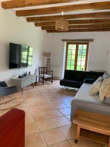 Χώρος καθιστικού στο Maison de campagne cosy, nature et souvenirs