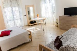 TV a/nebo společenská místnost v ubytování B&B Ore Liete