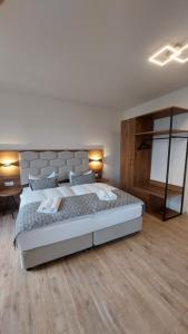 Postel nebo postele na pokoji v ubytování Hotel Kutzbach