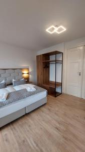 Postel nebo postele na pokoji v ubytování Hotel Kutzbach