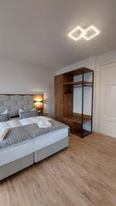 Postel nebo postele na pokoji v ubytování Hotel Kutzbach