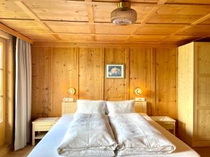Ένα ή περισσότερα κρεβάτια σε δωμάτιο στο Neuhauserhof