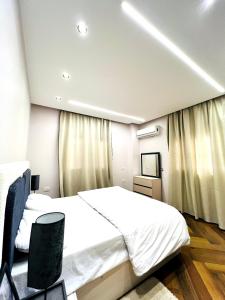 Postel nebo postele na pokoji v ubytování Luxury apartment + 5 fotografií