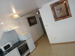 Kuchyň nebo kuchyňský kout v ubytování Le Pont des Rêves Unique - Tranquille + 18 fotografií