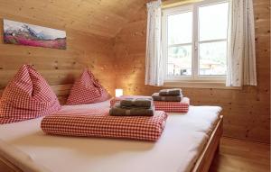 A bed or beds in a room at Charmantes Ferienhaus