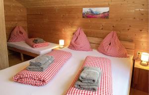 A bed or beds in a room at Charmantes Ferienhaus