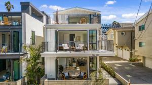 an aerial view of a house with a balcony at Beach Paradise - Stunning 3-Story in Long Beach in Long Beach