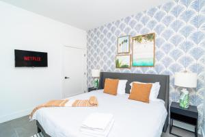 Postel nebo postele na pokoji v ubytování MetroPark Hotel