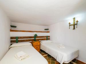 Posteľ alebo postele v izbe v ubytovaní Tu Villa Rural Olivo 3 Dormitorios Piscina privada