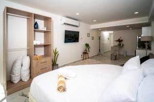 Ένα ή περισσότερα κρεβάτια σε δωμάτιο στο Barcelona Condos charming with modern design +21 φωτογραφίες