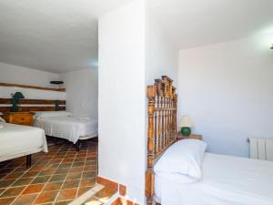 Posteľ alebo postele v izbe v ubytovaní Tu Villa Rural Olivo 3 Dormitorios Piscina privada